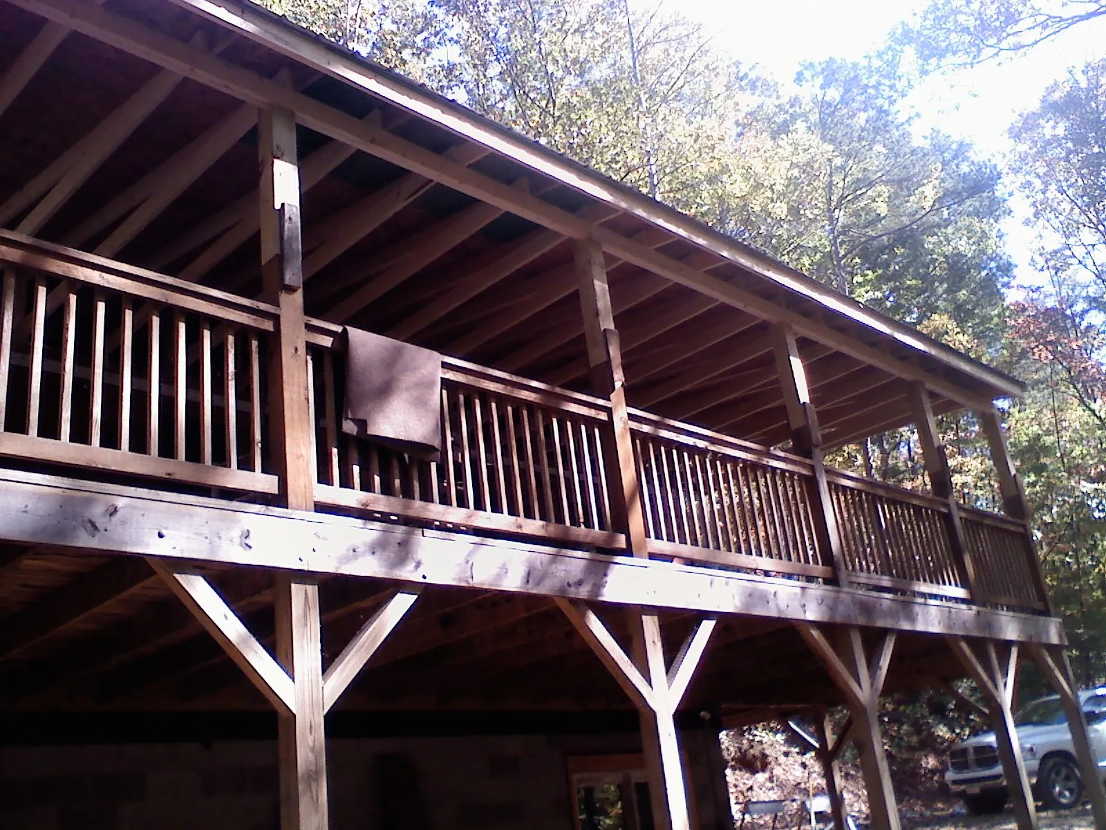Timber framing under a new elevated porch and deck — Roof Leak Repair in Canandaigua by Roofing Brothers